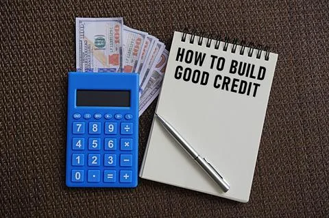 Writing note HOW TO BUILD GOOD CREDIT. Finance concept Stock Photos
