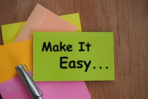 Writing note MAKE IT EASY. Job concept. Make every business easier 스톡 사진