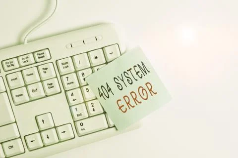 Writing note showing 404 System Error. Business photo showcasing message appears 库存照片