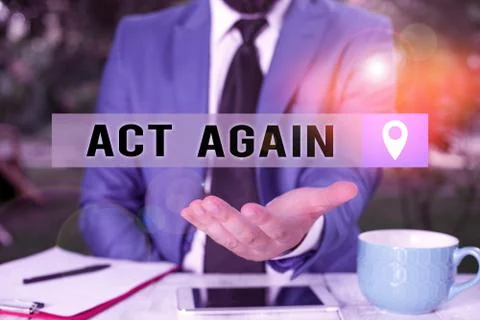 Writing note showing Act Again. Business photo showcasing do something for a Stock Photos
