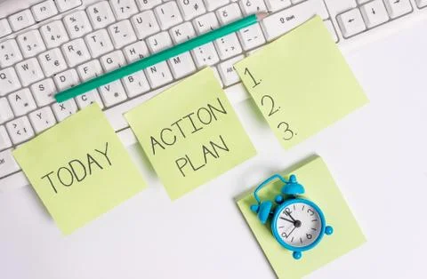 Writing note showing Action Plan. Business photo showcasing proposed strategy or Stock Photos
