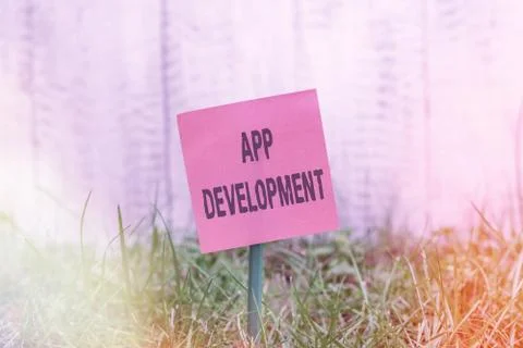 Writing note showing App Development. Business photo showcasing producing Stock-Fotos