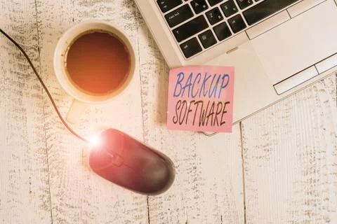 Writing note showing Backup Software. Business photo showcasing create extra Foto stock