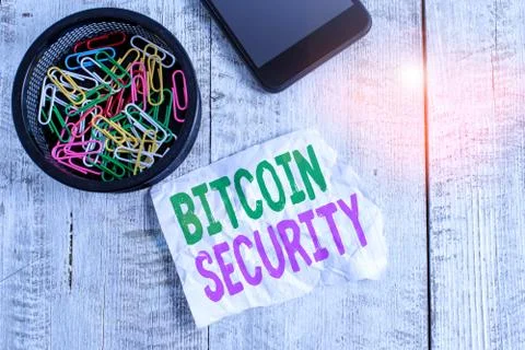Writing note showing Bitcoin Security. Business photo showcasing funds are 库存照片