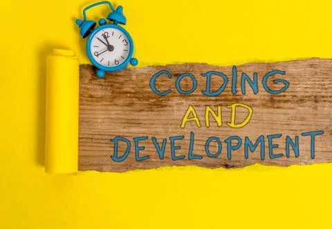 Writing note showing Coding And Development. Business photo showcasing Stock Photos