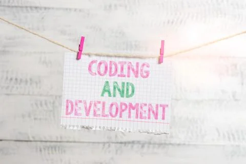 Writing note showing Coding And Development. Business photo showcasing Stock Photos