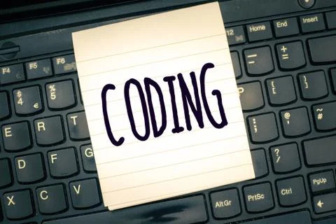 Writing note showing Coding. Business photo showcasing assigning code to some Stockfoto's