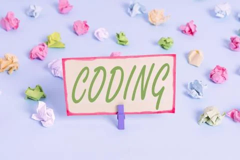 Writing note showing Coding. Business photo showcasing assigning code to Stockfoto's