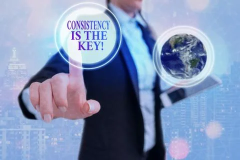Writing note showing Consistency Is The Key. Business photo showcasing by Stock Photos