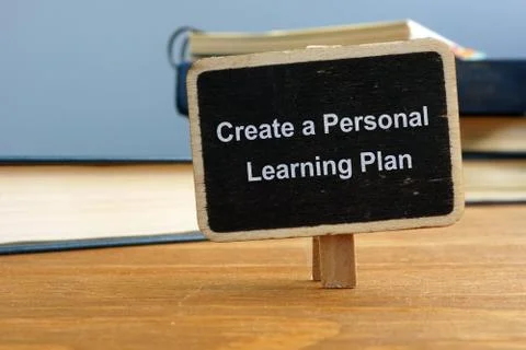 Writing note showing Create a Personal Learning Plan. The text is written on Stock Illustration