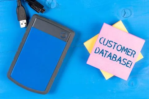 Writing note showing Customer Database. Business photo showcasing uptodate on Stock Photos