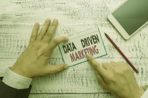 Writing note showing Data Driven Marketing. Business photo showcasing Strategy Stock Photos