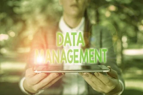 Writing note showing Data Management. Business photo showcasing disciplines Foto stock