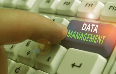 Writing note showing Data Management. Business photo showcasing disciplines Stock Photos