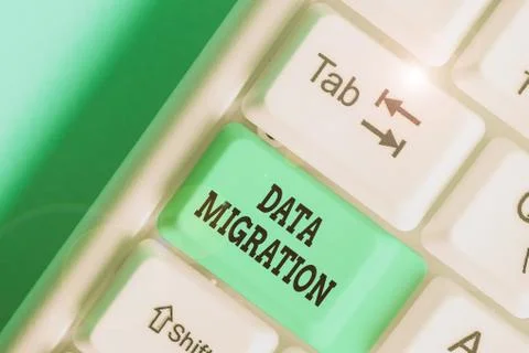 Writing note showing Data Migration. Business photo showcasing process of Stock Photos