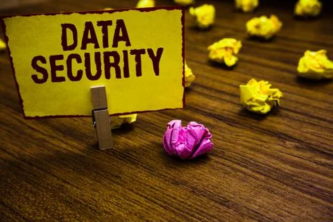Writing note showing Data Security. Business photo showcasing Confidentiality Stock Photos