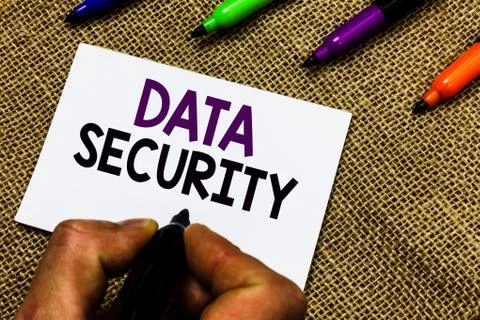 Writing note showing Data Security. Business photo showcasing Confidentiality Stock Photos
