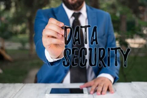 Writing note showing Data Security. Business photo showcasing Confidentiality Stock Photos