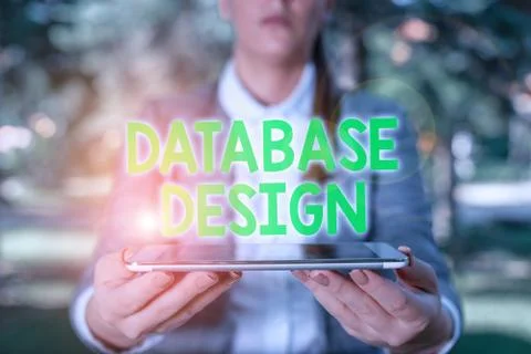 Writing note showing Database Design. Business photo showcasing organisation of Stock Photos