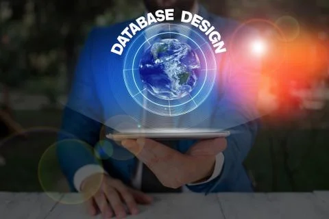 Writing note showing Database Design. Business photo showcasing organisation of Foto stock