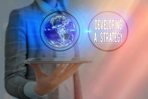 Writing note showing Developing A Strategy. Business photo showcasing Discussing Stock Photos