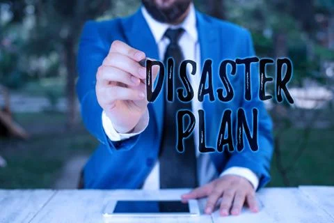Writing note showing Disaster Plan. Business photo showcasing Respond to Stock Photos