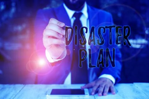 Writing note showing Disaster Plan. Business photo showcasing Respond to Stock Photos