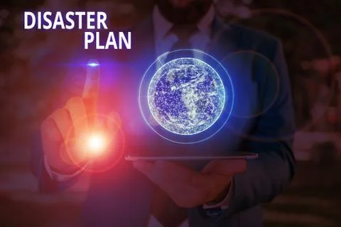 Writing note showing Disaster Plan. Business photo showcasing outlines how an Stock Photos