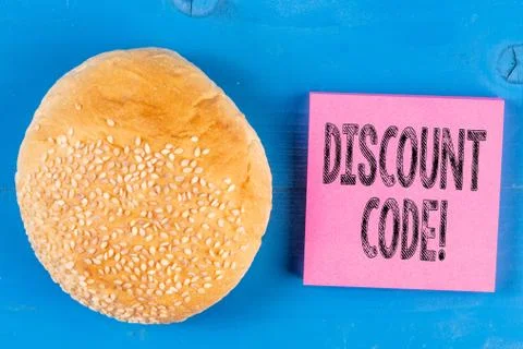 Writing note showing Discount Code. Business photo showcasing Series of letters Stock-Fotos