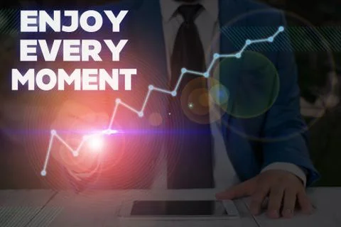Writing note showing Enjoy Every Moment. Business photo showcasing being pleased Stock Photos