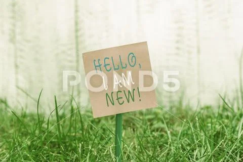 Writing note showing Hello I Am New. Business photo showcasing introducing Stock Photos