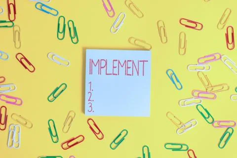 Writing note showing Implement. Business photo showcasing to provide instruments Stock Photos
