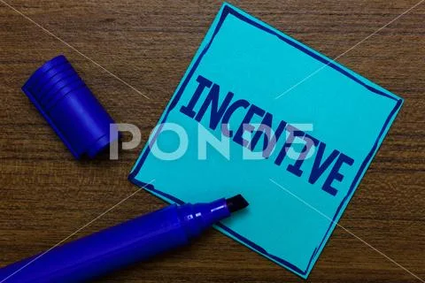 Writing note showing Incentive. Business photo showcasing thing that motivate Stock Photos