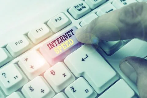 Writing note showing Internet Speed. Business photo showcasing the rate which Stockfoto's