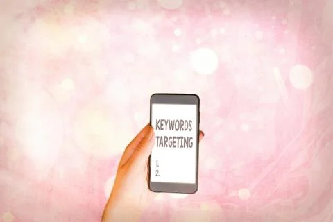 Writing note showing Keywords Targeting. Business photo showcasing Use Relevant Stock-Fotos