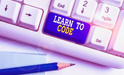 Writing note showing Learn To Code. Business photo showcasing Learn to write Stockfoto's