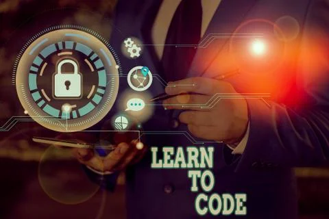 Writing note showing Learn To Code. Business photo showcasing Learn to write Stockfoto's