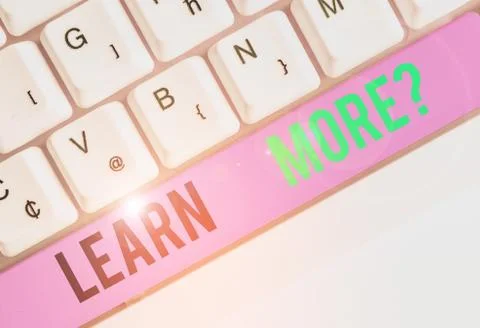 Writing note showing Learn More question. Business photo showcasing gain Stock Photos