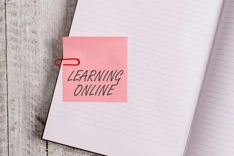 Writing note showing Learning Online. Business photo showcasing Learn something Fotos de archivo