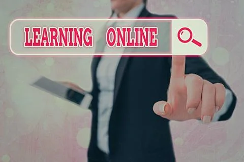 Writing note showing Learning Online. Business photo showcasing Learn something Fotos de archivo