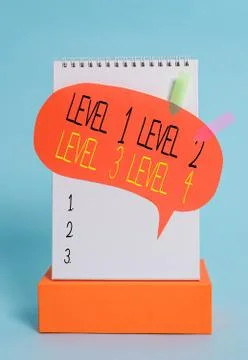 Writing note showing Level 1, 2, 3 and 4. Business photo showcasing Steps levels Stock Photos