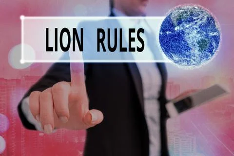 Writing note showing Lion Rules. Business photo showcasing epitome of strength Stock Photos