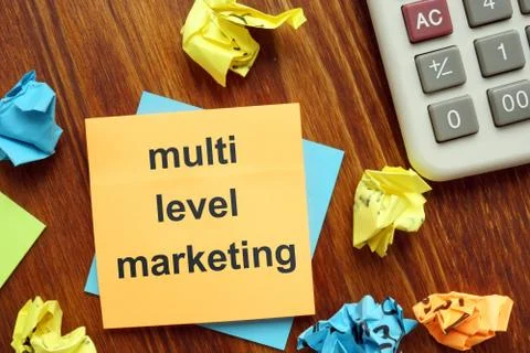 Writing note showing multi level marketing. The text is written on a small co Stock Photos
