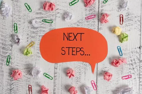 Writing note showing Next Steps. Business photo showcasing something you do or Stock Photos