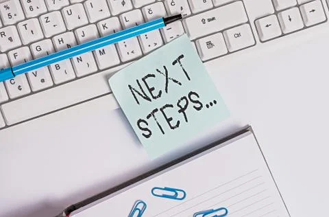 Writing note showing Next Steps. Business photo showcasing something you do Stock Photos