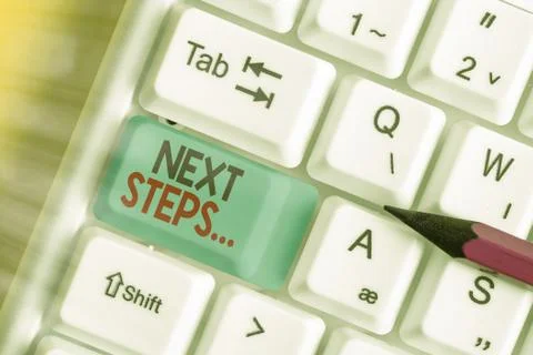 Writing note showing Next Steps. Business photo showcasing something you do Stock Photos