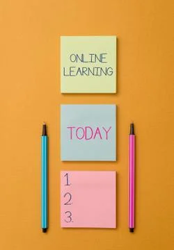 Writing note showing Online Learning. Business photo showcasing Larning with the Stock Photos