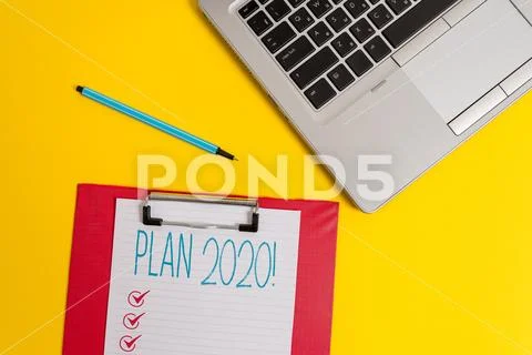 Writing note showing Plan 2020. Business photo showcasing detailed proposal Stock Photos