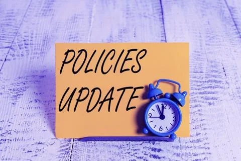 Writing note showing Policies Update. Business photo showcasing act of adding Stock Photos