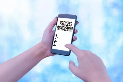 Writing note showing Process Improvement. Business photo showcasing task of Foto stock